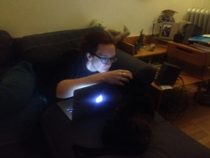 That cliche "Writer with Mac on couch and cat" portrait. The dark blob I'm duck-facing at is our kitty, Matilda. 