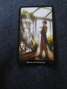 7 of Pentacles from the Steampunk Tarot by Barbara Moore.