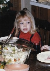 Me at 5 (I think). A family dinner..I'm sure fried chicken was on the other end of that salivating gaze.