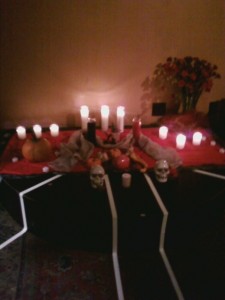 Altar from my Coven's Samhain three years ago, just after Super-Storm Sandy. The candles were meant to honor those who had passed over in the previous year, particularly those lost to the storm.